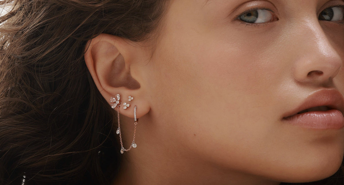 MIA yellow gold floating diamond hoop earring front view