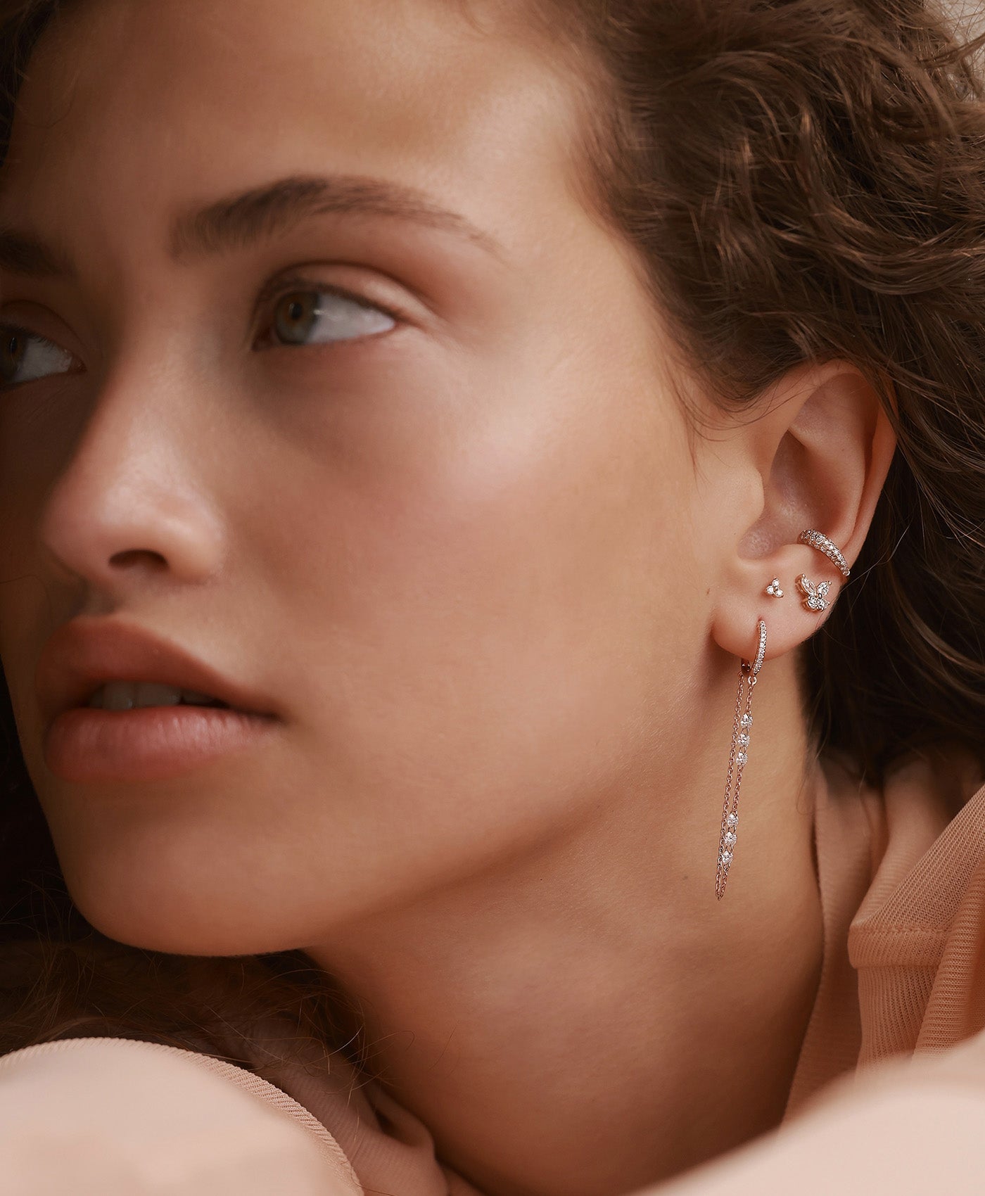 MELANIA FLOW DIAMONDS HUGGIE HOOP EARRING