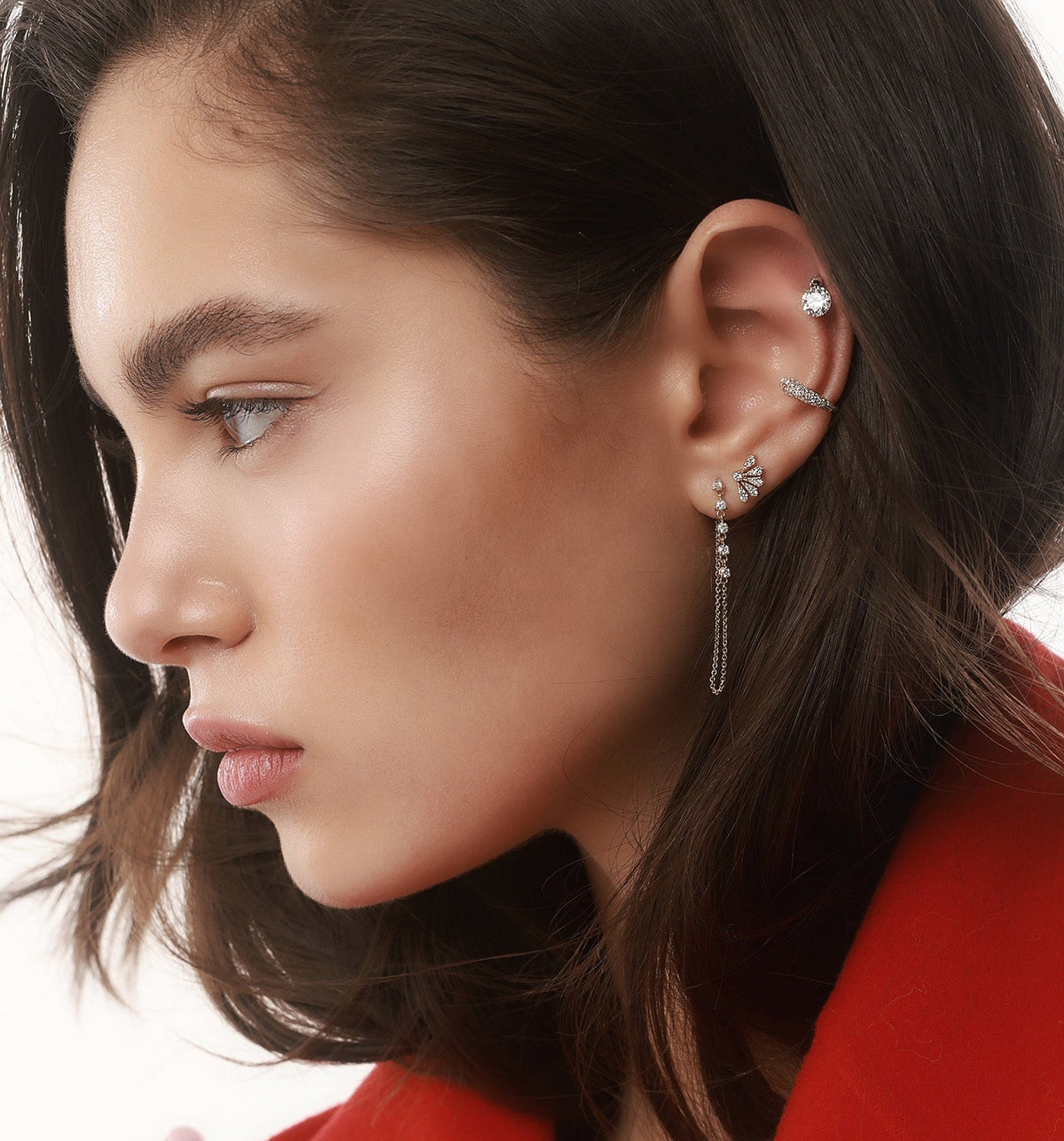 Model wearing a 14K rose gold heart pinky ring set with natural diamonds, styled with GLO